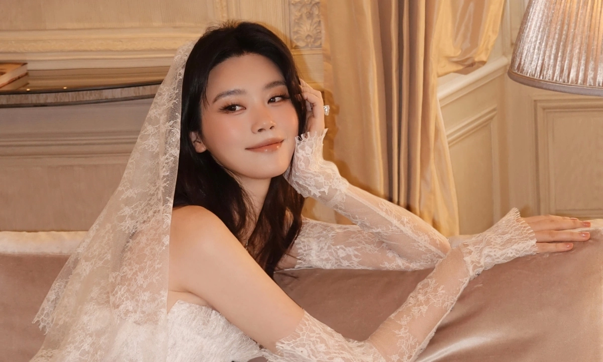 Thưởng đăng ký SC88: Hề Mộng Dao rạng rỡ trong váy cưới thiết kế Việt - hình ảnh - sc88go.com